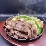 Grilled raw lamb jingisukan (grilled lamb on a hot plate)