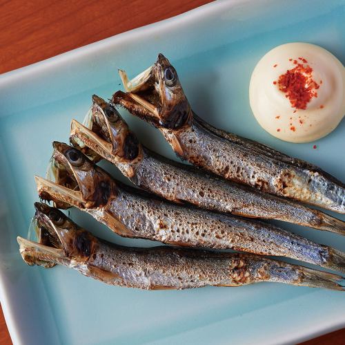 Whole dried grilled round herring