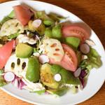 Chunky vegetables and soft-boiled egg salad with truffle oil