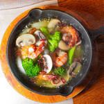 Shrimp and mushroom ajillo with bucket