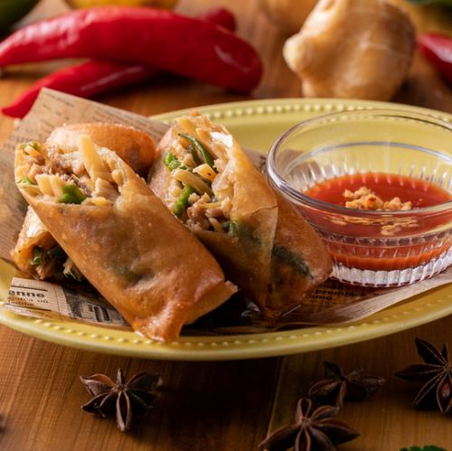 Deep fried green pepper and pork spring rolls