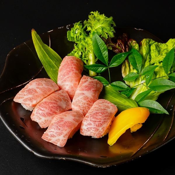 Tamon's famous Kuroge Wagyu beef nigiri 6 pieces 2310 yen