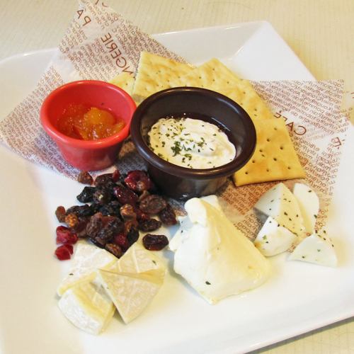 Assortment of homemade cheeses and cheeses from around the world