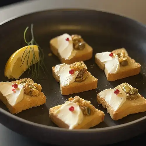 Pickled olives and nut canapés