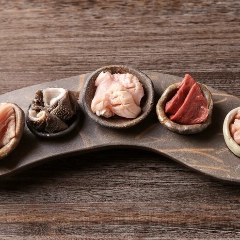 A platter of five different kinds of fresh offal