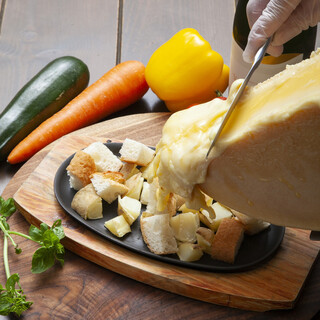 A wide variety of melty cheese dishes, including ``Lampada's famous raclette cheese''!