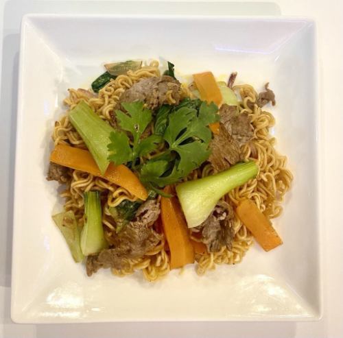 Spicy fried noodles with beef and bok choy