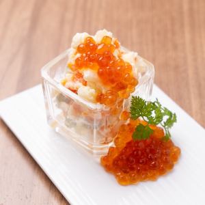 Potato salad topped with plenty of salmon roe