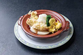 Blackthroat seaperch tempura and turnip in a clay pot