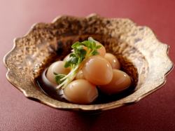 Soft-boiled quail eggs marinated in soy sauce