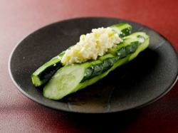 Cucumber slices with green onion and ginger sauce