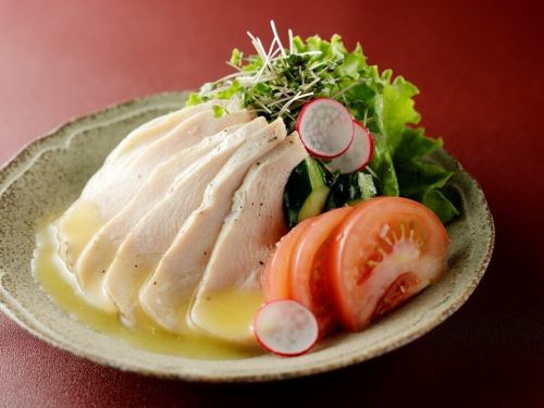 Low-temperature roasted chicken breast with salad