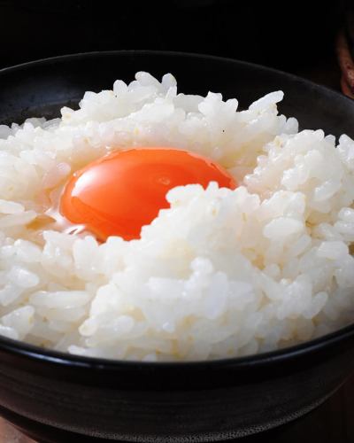 Egg-cooked rice made with Koshihikari rice from terraced rice fields cooked in an earthenware pot.