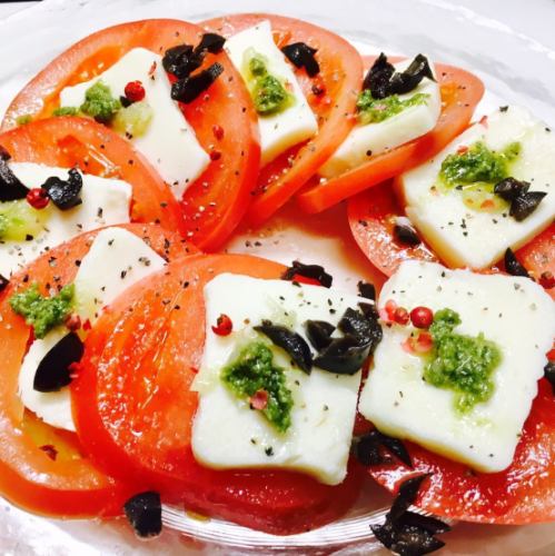 Caprese with fresh tomatoes and mozzarella