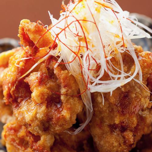 Deep fried chicken with onion sauce