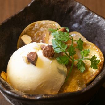 Freshly fried potato chips served with vanilla ice cream