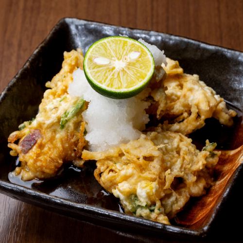 Mushroom tempura with grated sudachi citrus