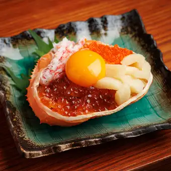 カニ甲羅の背徳盛り