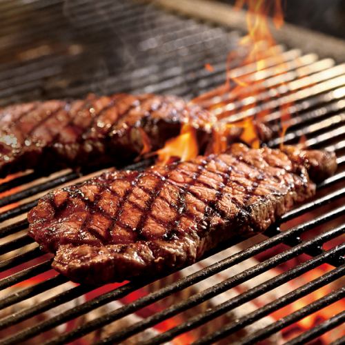 A proud steak prepared by a master charcoal griller.