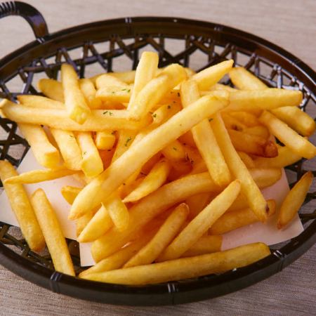 Freshly fried potato fries