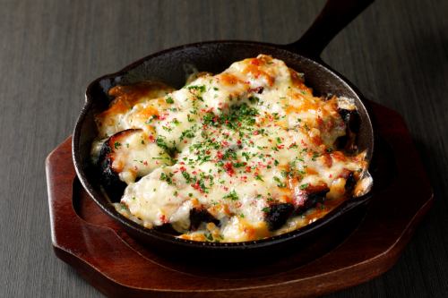 Hokkaido black bacon and potatoes baked with plenty of cheese