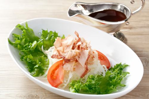 Onion salad with plum ponzu sauce