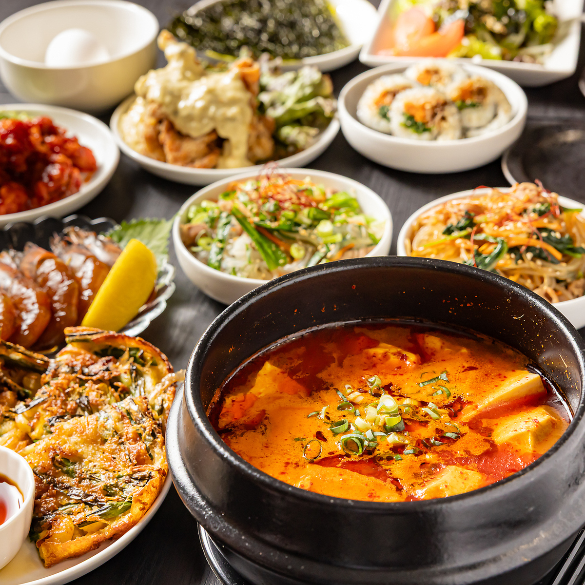 Enjoy authentic Korean cuisine made with a focus on homemade ingredients! A wide variety of sundubu stews with your choice of spiciness levels and small side dishes are available.