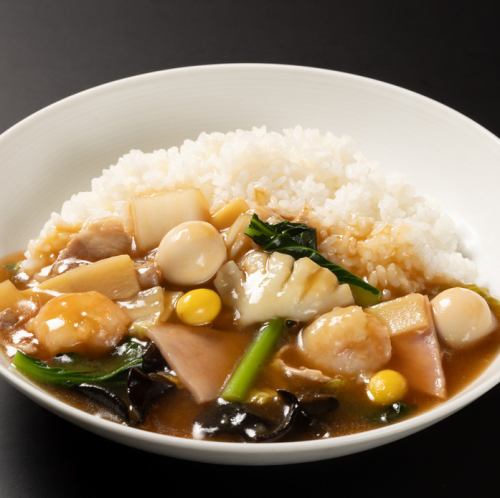 One serving of Chinese rice bowl with lots of ingredients