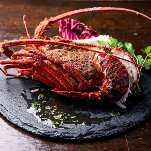 Whole spiny lobster grilled with herbs and cheese