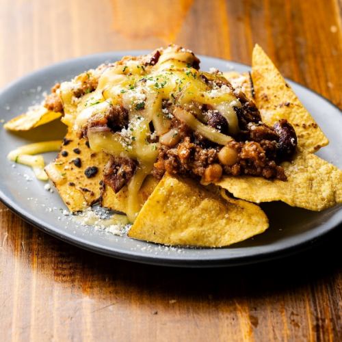 Homemade chili con carne and tortilla chips