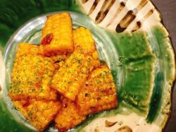 Sweet and spicy grilled corn with butter and soy sauce