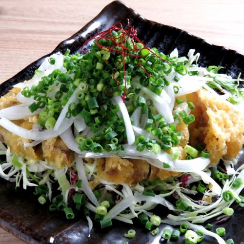 Black pork tempura covered with green onions