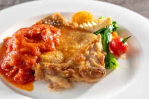 Chicken steak with puttanesca sauce