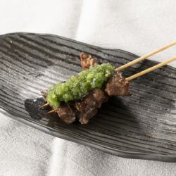 Grilled beef tenderloin with green onions and salt
