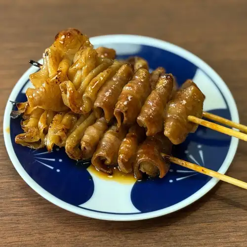 One skewer of grilled pork (offal)
