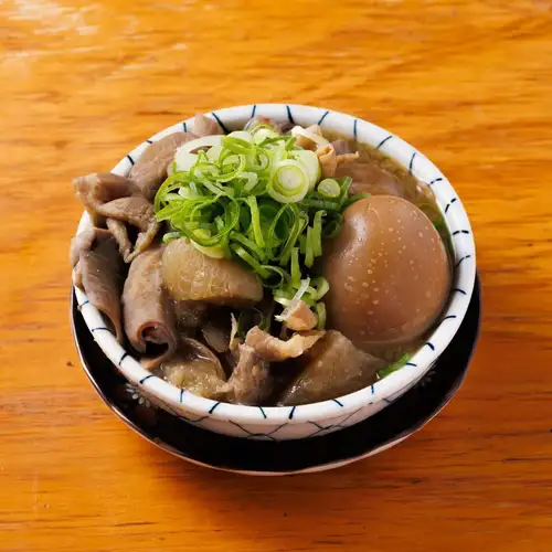 Stewed offal with boiled egg