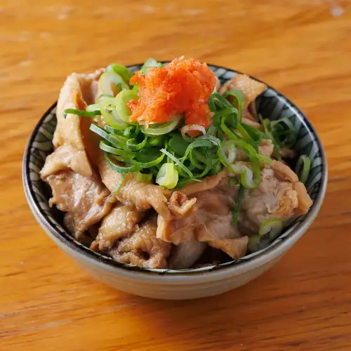 Chicken skin with aromatic green onions in ponzu sauce
