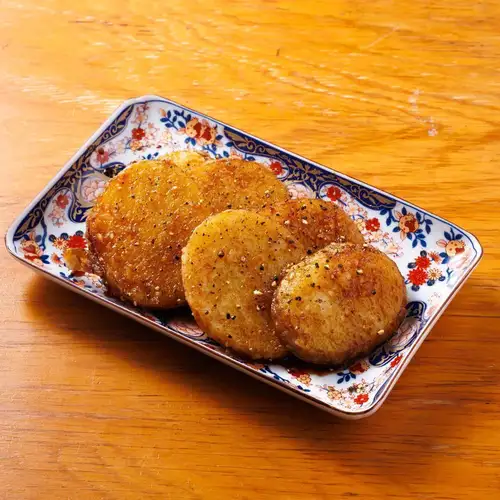 Potatoes baked in a savory spicy sauce