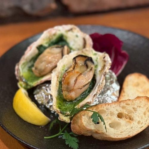 Garlic butter sautéed Hiroshima oysters and spinach