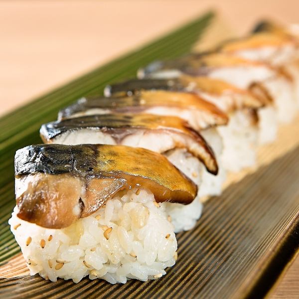 Our specialty: grilled mackerel stick sushi