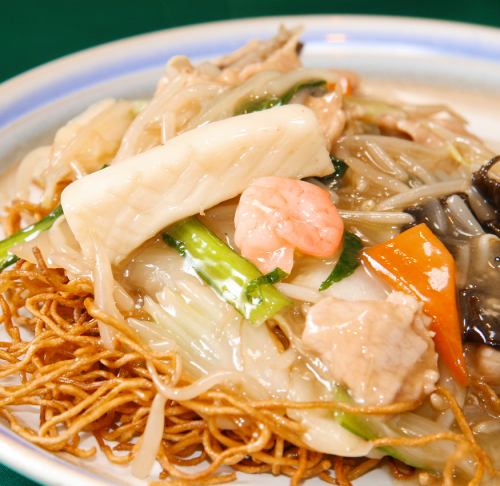 Fried noodles with mixed vegetables and thickened sauce / Fried noodles with mixed vegetables and thickened sauce