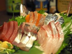 Five pieces of raw fish sashimi