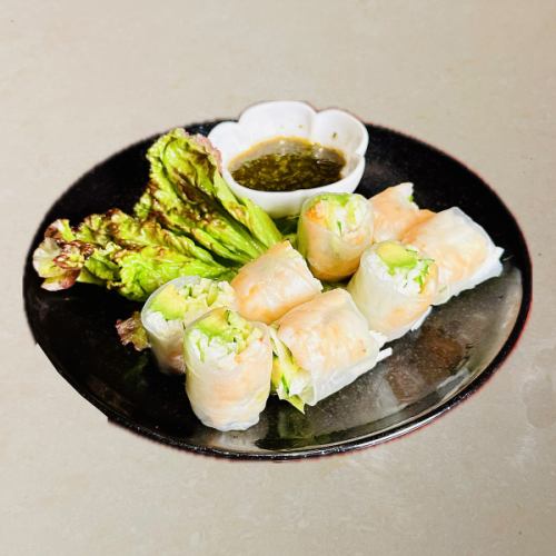 Shrimp, avocado and yam spring rolls with basil and soy sauce