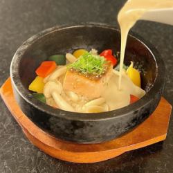 Salmon and perilla leaves with soy milk cream on hot stone rice
