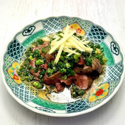 Liver and green onion covered with salt and sesame oil