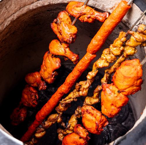 正宗窑炉烹制的肉类菜肴