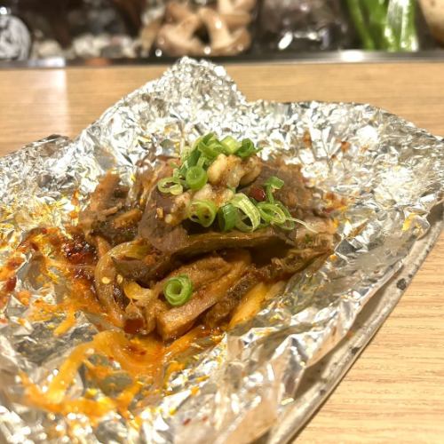 Spicy Wagyu beef offal mix baked in foil