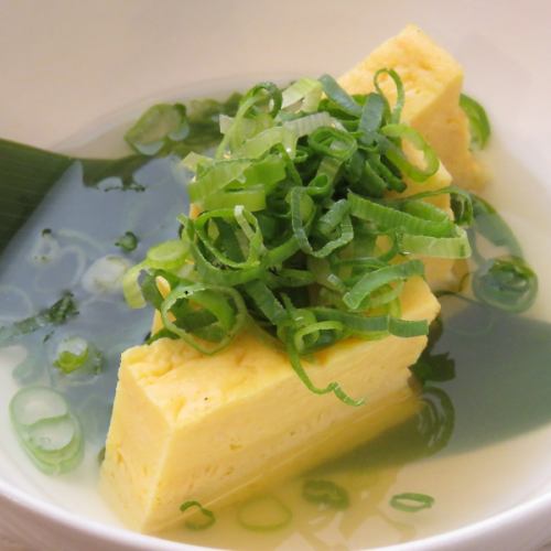 Tamagoyaki with spring onion and soup stock