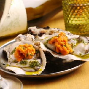 Raw oysters topped with sea urchin