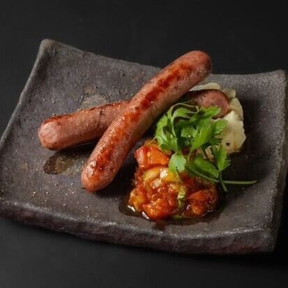 Lamb sausage and salsa sauce